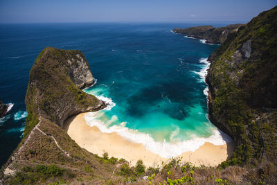 High angle view of sea shore against sky