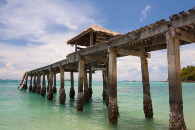 Pier over sea against sky