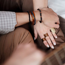 Close-up of woman hand on wall