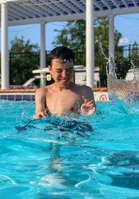 Man swimming in pool