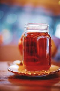 Close-up of drink in jar on table