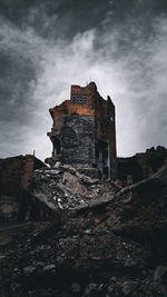 Low angle view of old building against sky