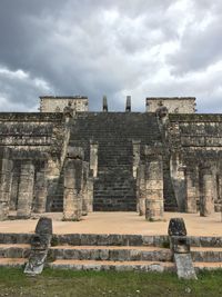 Old ruin building against cloudy sky