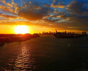 Silhouette of city at sunset