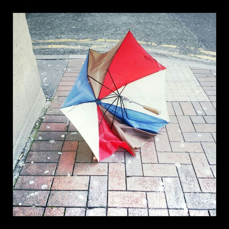 red, flag, transfer print, patriotism, auto post production filter, identity, umbrella, absence, day, national flag, multi colored, no people, american flag, sunlight, high angle view, outdoors, empty, shadow, street, close-up