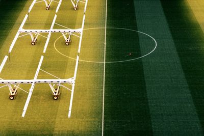 Low angle view of playing soccer on field