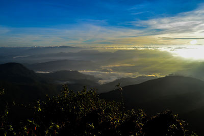 Scenic view of mountains against sky during sunset