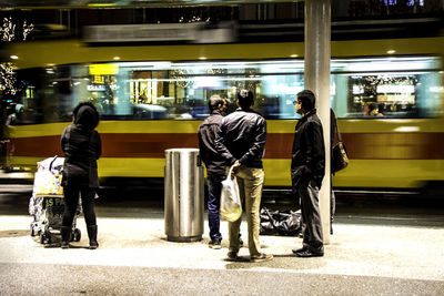 Woman standing at night