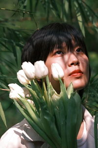 Close-up of young woman looking away