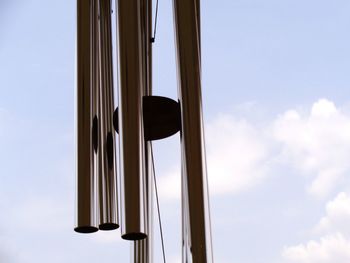 Low angle view of metal structure against sky