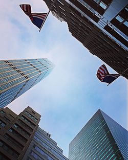 Low angle view of skyscraper against sky