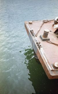 High angle view of boat sailing in lake