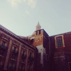 Low angle view of historic building against sky