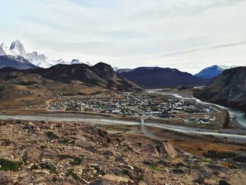 Scenic view of landscape and mountains against sky