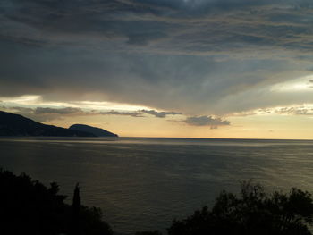Scenic view of sea against sky during sunset