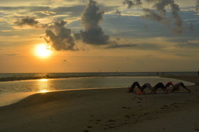 Scenic view of sea at sunset