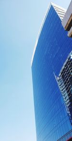 Low angle view of modern building against clear sky