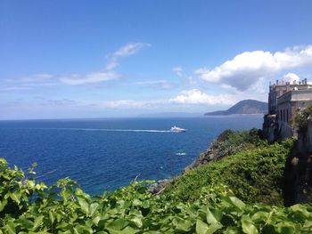 Scenic view of sea against cloudy sky