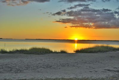 Scenic view of sea against sky during sunset