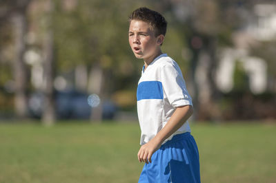 Teen soccer player yelling on the field