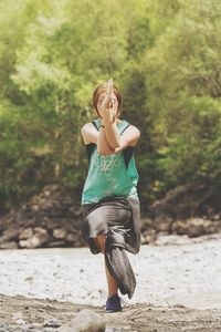 Full length of woman standing on land