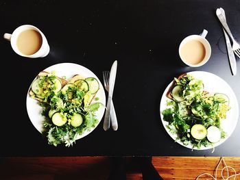 High angle view of coffee served on table