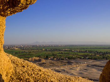 High angle view of field against clear sky