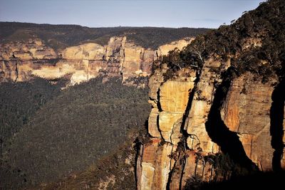 Shadow of people on rock