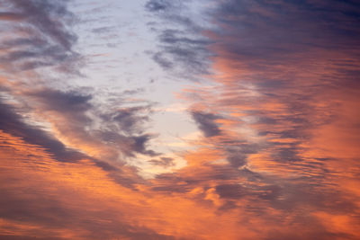 Low angle view of dramatic sky during sunset
