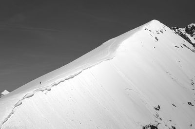 Low angle view of snow covered mountain