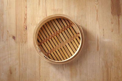 Directly above shot of wooden container on table