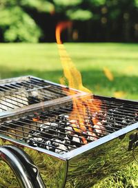 Close-up of meat on barbecue grill