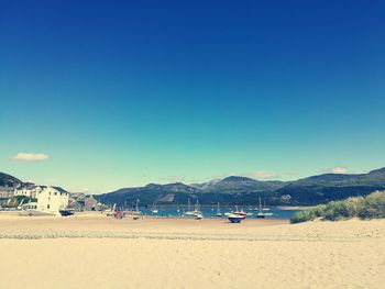 View of beach against blue sky