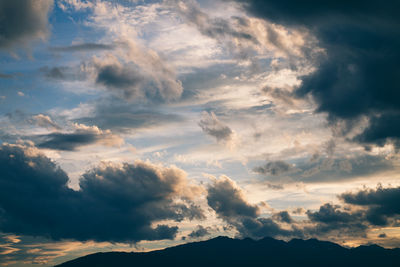 Low angle view of dramatic sky during sunset