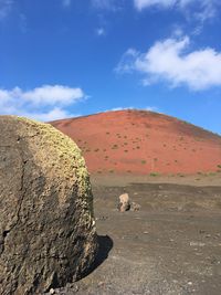 Scenic view of land against sky