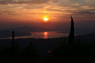 Scenic view of sunset over sea