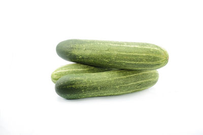 Close-up of green pepper against white background