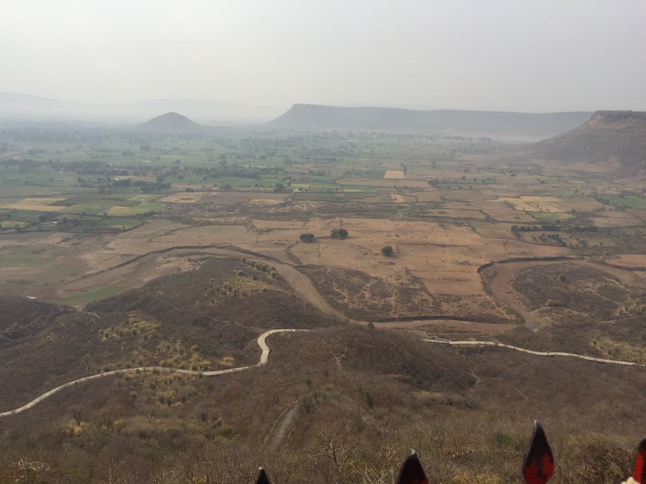 HIGH ANGLE VIEW OF ROAD AGAINST SKY