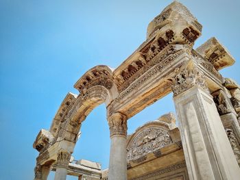 Low angle view of old temple against sky