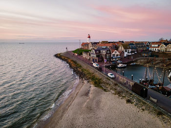 Scenic view of beach against sky during sunset