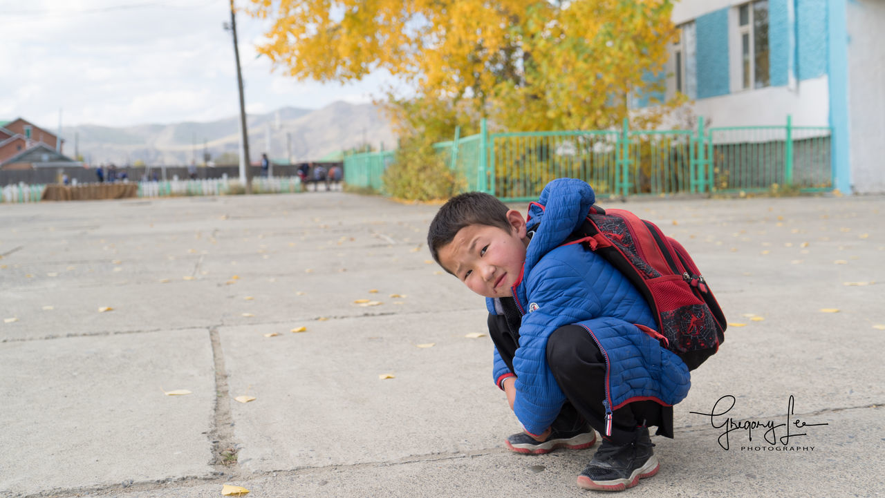 childhood, real people, building exterior, boys, full length, outdoors, one person, day, built structure, architecture, people