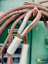 Close-up of rope tied on wood