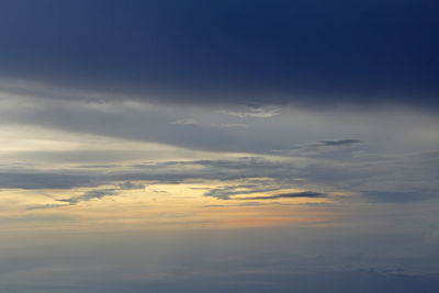 Low angle view of clouds in sky during sunset