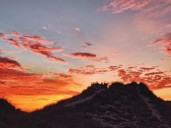 Scenic view of dramatic sky during sunset