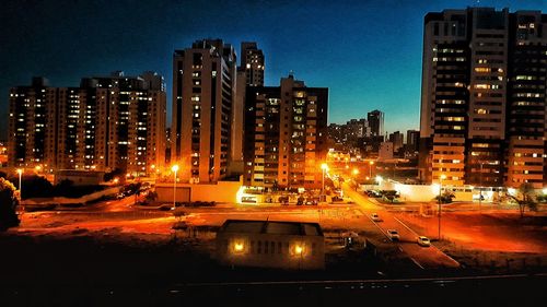 Traffic on city street at night