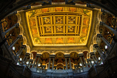 Low angle view of illuminated ceiling of building