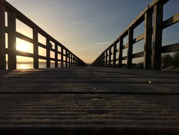 View of wooden structure at sunset