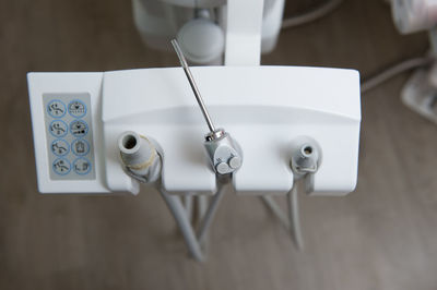 High angle view of dentist tool on table