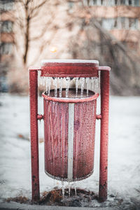 High angle view of frozen garbage bin