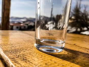 Close-up of drinking glass on table